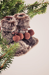 Image showing Winter boots with christmas tree, retro toned