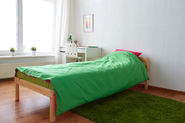 Image showing kids room interior with bed, table and accessories