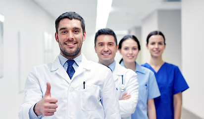 Image showing medics or doctors at hospital showing thumbs up