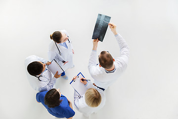 Image showing doctors with spine x-ray and clipboards