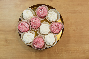 Image showing zephyr or marshmallow on cake stand