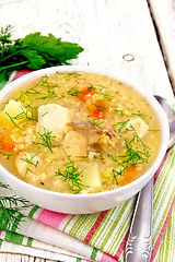 Image showing Soup fish with millet on board