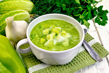 Image showing Soup cucumber in white bowl on light board