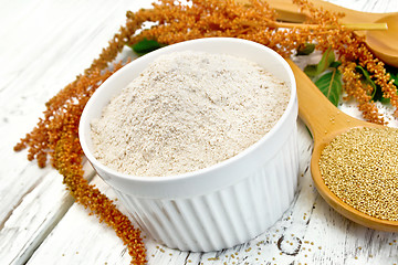 Image showing Flour amaranth in bowl with spoon on board
