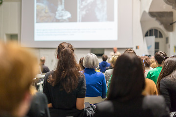 Image showing Man giving presentation in lecture hall at university.