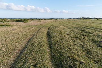 Image showing Winding country road in a grassland