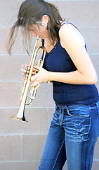 Image showing Female trumpet player.