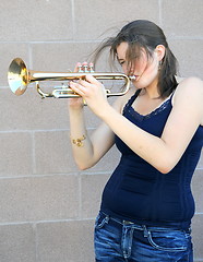 Image showing Female trumpet player.