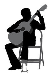 Image showing Young man playing acoustic guitar