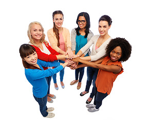 Image showing international group of women with hands together