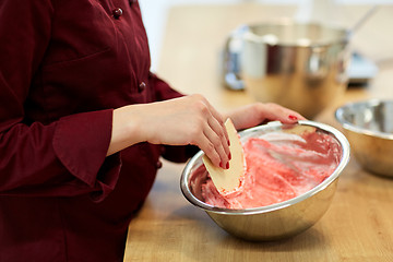 Image showing chef making macaron batter at confectionery