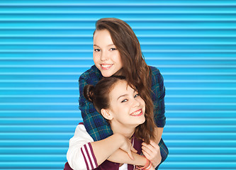 Image showing happy smiling pretty teenage girls hugging