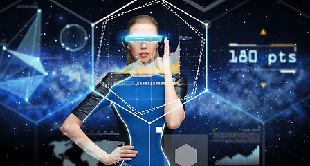 Image showing woman in virtual reality 3d glasses with charts