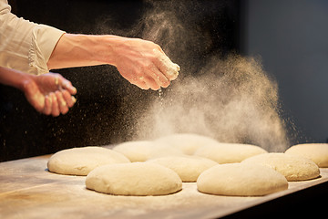 Image showing chef or baker cooking dough at bakery