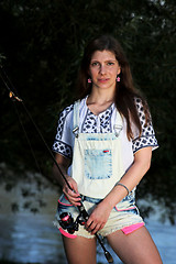 Image showing Young woman with summer sprouts