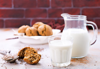 Image showing bread and milk on a table