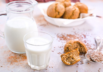 Image showing bread and milk on a table