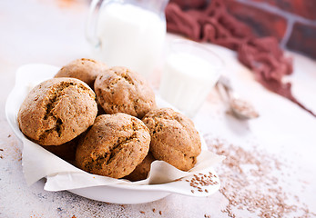 Image showing bread and milk on a table