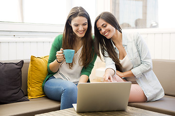 Image showing Female friends at te coffee