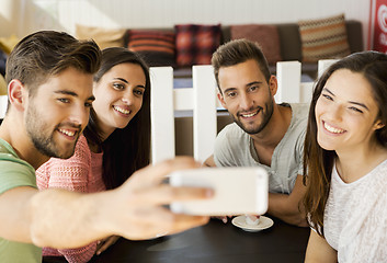 Image showing Group selfie at the coffee shop