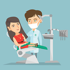 Image showing Patient and doctor in the office of a dentist.