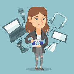 Image showing Young caucasian woman surrounded by her gadgets.