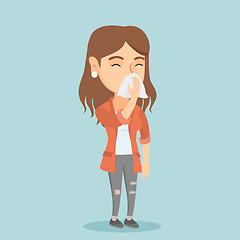 Image showing Young caucasian sick woman sneezing.