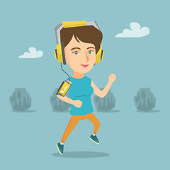 Image showing Young woman running with earphones and smartphone.