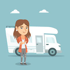 Image showing Caucasian woman standing in front of motorhome.