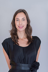 Image showing woman in a black dress isolated on white background