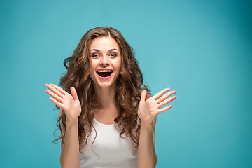 Image showing The young woman\'s portrait with happy emotions