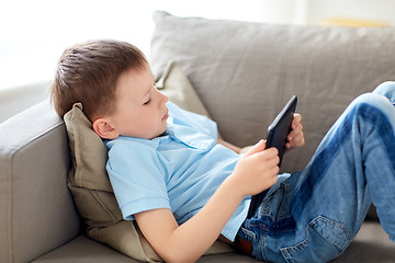 Image showing little boy with tablet pc computer at home