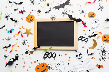 Image showing blank chalkboard and halloween party decorations