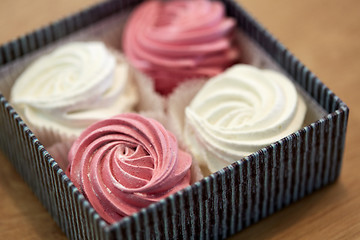 Image showing close up of zephyr or marshmallows in gift box