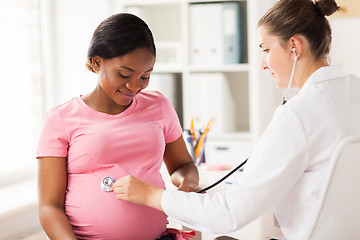 Image showing gynecologist doctor and pregnant woman at hospital