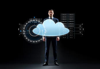 Image showing businessman in suit with virtual cloud hologram