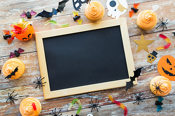 Image showing blank chalkboard and halloween party decorations