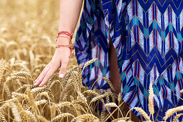 Image showing close up of young hippie woman on cereal field