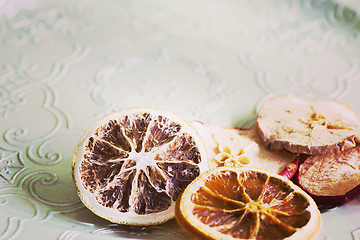 Image showing Dried orange and apple slices, retro toned