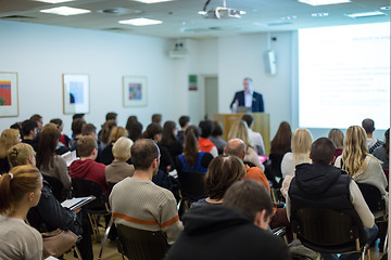 Image showing Man giving presentation in lecture hall at university.