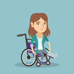 Image showing Woman with broken leg sitting in a wheelchair.