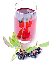 Image showing Glass of aronia juice with berries