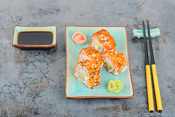 Image showing Sushi rolls with masago. Top view.