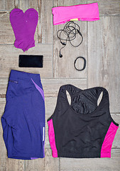 Image showing Flat lay shot of woman\'s sport accessories