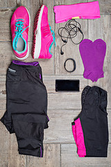 Image showing Flat lay shot of woman\'s sport accessories