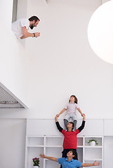 Image showing young boys posing line up piggyback