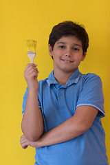 Image showing Portrait of a happy young boy painter