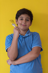 Image showing Portrait of a happy young boy painter