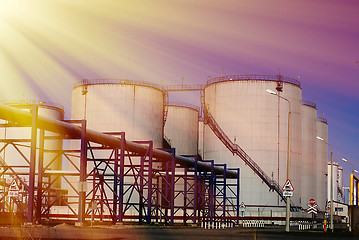 Image showing Industrial zone, Steel pipelines and tanks against blue sky