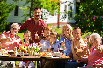 Image showing happy family having dinner or summer garden party